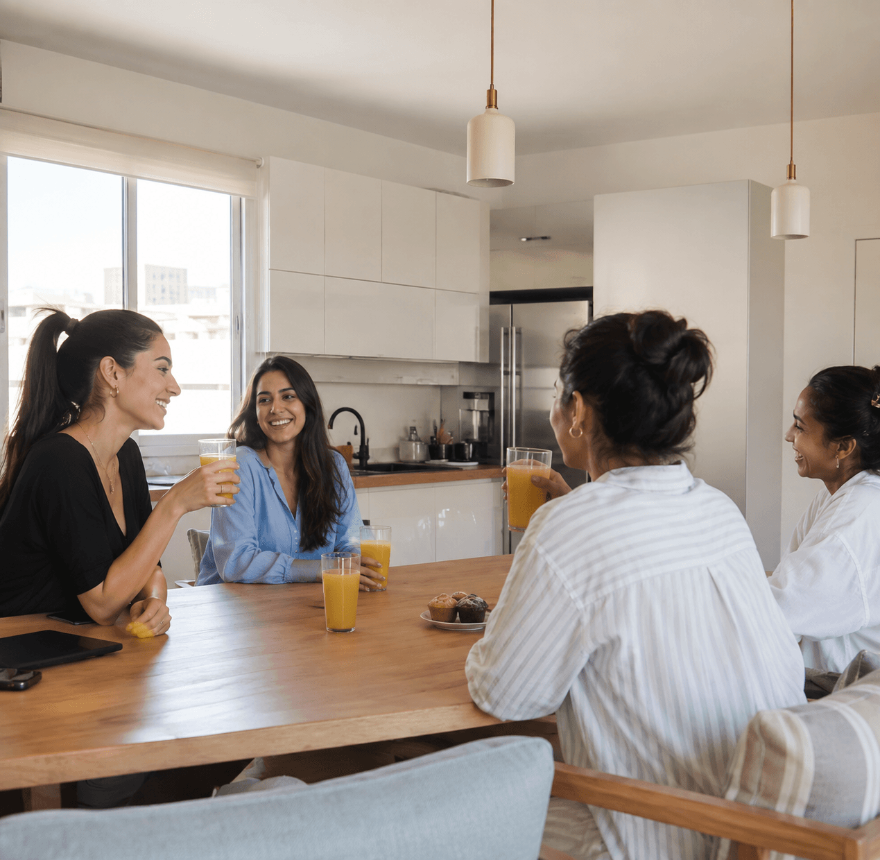 Roommates sharing breakfast in a Host'lik home